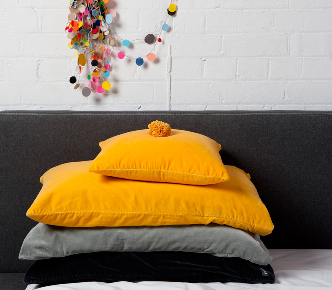 Yellow velvet cushion