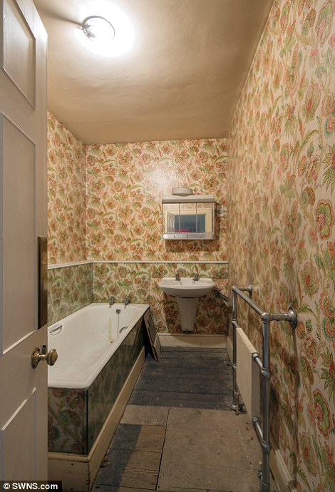 wallpapered bathroom
