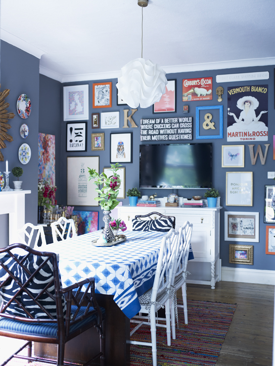 Bold art wall as seen in Home for Now by Joanna Thornhill